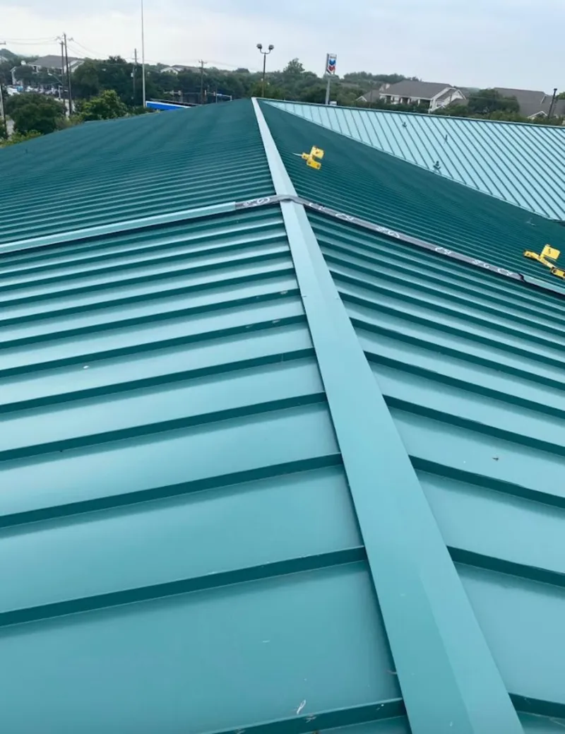 Green commercial metal roof ridge and valley for Metal Roof Repair in Fletcher