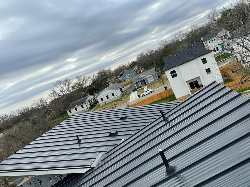 Standing seam metal roof panels with vents for Skylight Repair in Fletcher